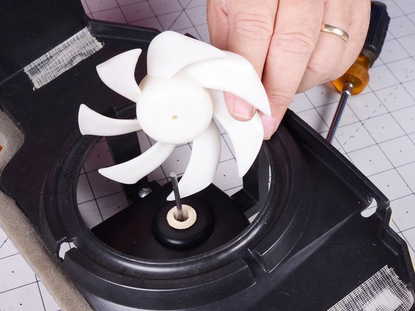 LG Refrigerator Evaporator Fan Replacement, Remove the fan blades from the fan motor shaft: crwdns2935265:025crwdnd2935265:03crwdnd2935265:03crwdne2935265:0