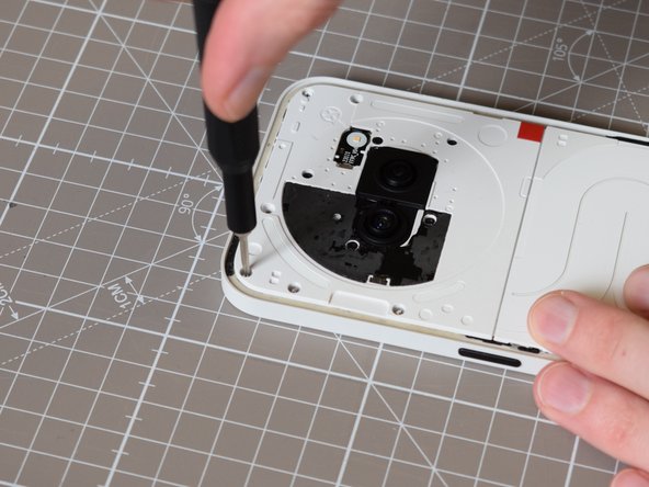 Nothing Phone (2a) Battery Replacement, Undo x6 Phillips 00 Screw: crwdns2935265:06crwdnd2935265:03crwdnd2935265:03crwdne2935265:0