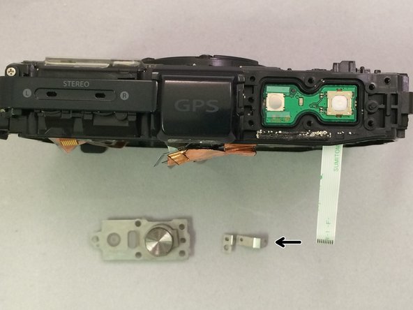 Olympus Stylus Tough TG-2 iHS Shutter/Power Button Replacement: crwdns2935265:015crwdnd2935265:03crwdnd2935265:03crwdne2935265:0