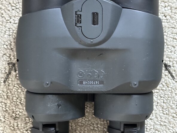 Canon Binocular 10x30 IS Battery cover Replacement, Removing the bottom cover, part A: crwdns2935265:01crwdnd2935265:02crwdnd2935265:03crwdne2935265:0