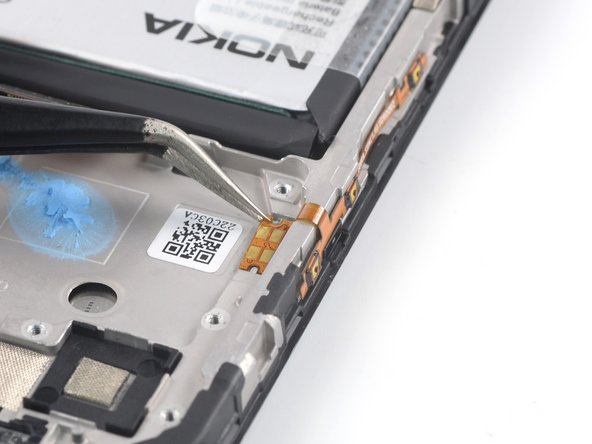 Nokia G22 Vervanging van de schermmodule, Verwijder de kabel van de volume- en aan-uitknop: stap 30, afbeelding 1 van 3