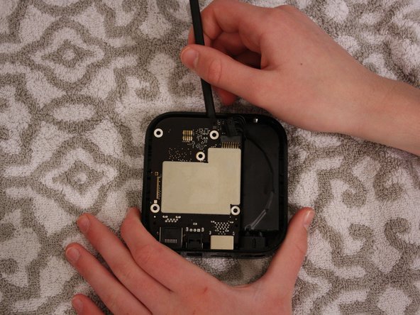 Apple TV 3rd Generation Disassembly, Unfasten the cables: crwdns2935265:03crwdnd2935265:03crwdnd2935265:03crwdne2935265:0