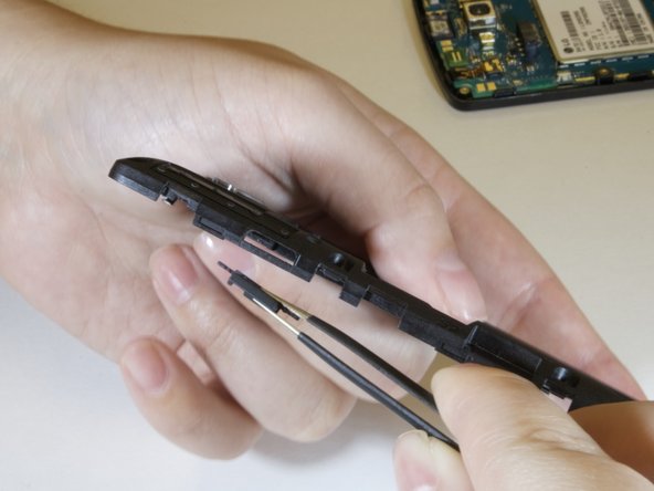 LG Optimus F60 Power Button Replacement: crwdns2935265:05crwdnd2935265:03crwdnd2935265:03crwdne2935265:0