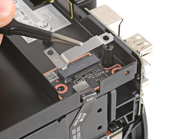 Steam Machine (2026) SSD Board Replacement, Remove the SSD board cable cover: step 13, image 2 of 2