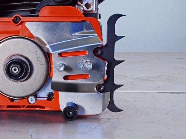 Echo Chain Saw CS4910 2020 Oiler System Replacement, Unfasten the bumper spike: crwdns2935265:010crwdnd2935265:02crwdnd2935265:02crwdne2935265:0