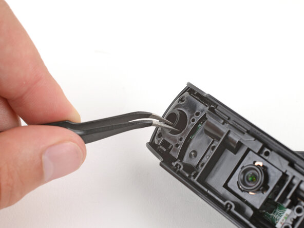 How to Open Your Logitech C920s Webcam, Remove the rubber spacers: crwdns2935265:013crwdnd2935265:01crwdnd2935265:03crwdne2935265:0
