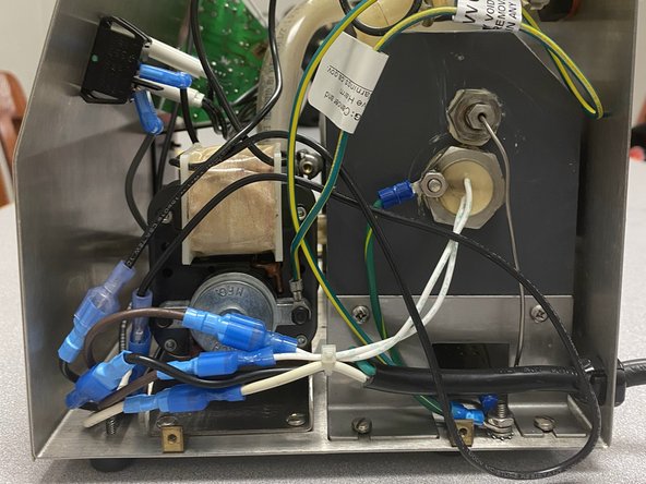 VWR Heated Circulator Water Pump Replacement, Remove side panel: step 1, image 3 of 3