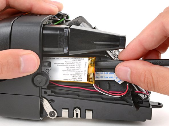 Polaroid Flip Battery Replacement, Separate the battery adhesive: crwdns2935265:015crwdnd2935265:02crwdnd2935265:03crwdne2935265:0