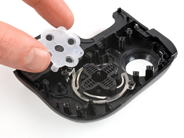 Razer Kishi Direction Pad Replacement, Remove the rubber cover: crwdns2935265:014crwdnd2935265:03crwdnd2935265:03crwdne2935265:0