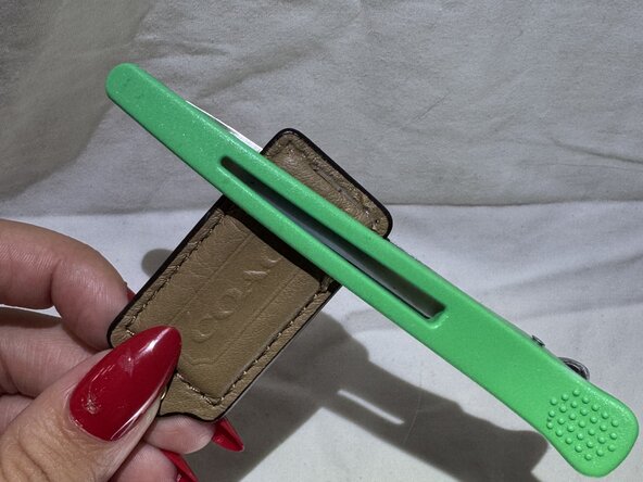 Coach Purse Tag Repair: step 5, image 1 of 1