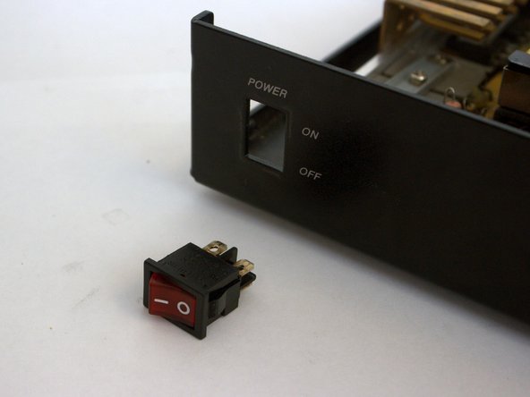 RadioShack 22-510 Switching Power Supply Teardown, Remove Switch: crwdns2935265:04crwdnd2935265:03crwdnd2935265:03crwdne2935265:0