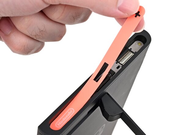 Nintendo Switch 2 Microphone Replacement, Remove the right side sticker: crwdns2935265:08crwdnd2935265:02crwdnd2935265:03crwdne2935265:0