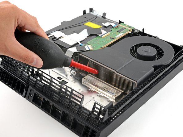How to Open and Clean a PlayStation 4, Clean the heatsink: crwdns2935265:011crwdnd2935265:02crwdnd2935265:02crwdne2935265:0