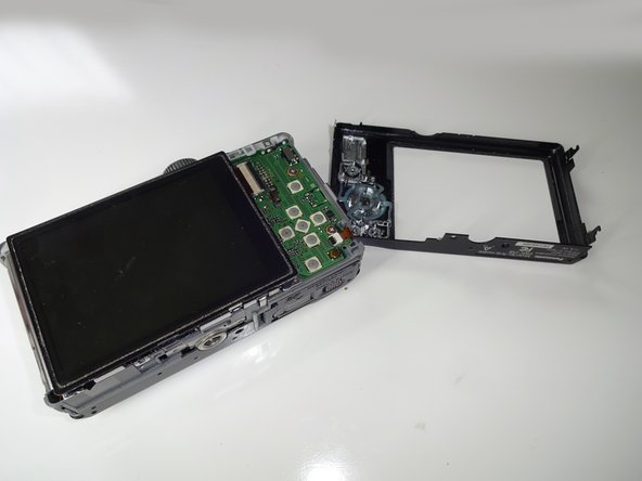 Panasonic DMC-ZS8 Digital Camera Door Replacement, Remove front and rear covers: step 3, image 2 of 3