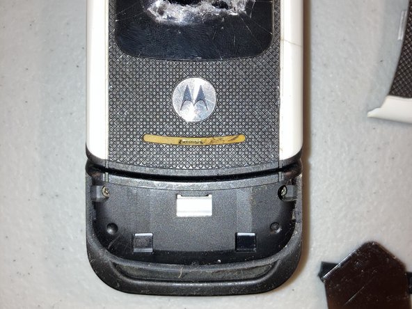 Motorola MOTOACTIV W450 Teardown, Next Screws: crwdns2935265:04crwdnd2935265:02crwdnd2935265:03crwdne2935265:0