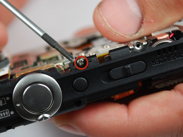 Canon PowerShot SD870 IS Shutter Release Button Replacement: passo 0, immagine 2 di 2