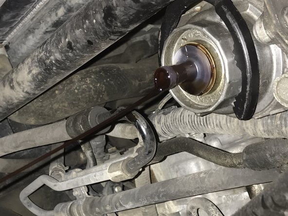 When draining has stopped, remove drain tool by firmly pulling down.