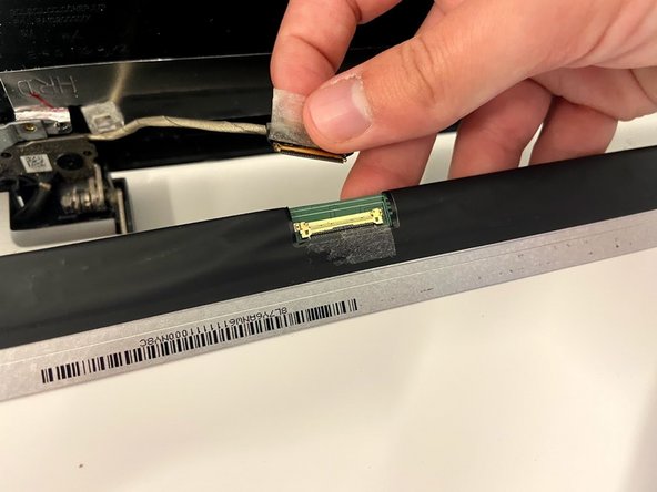HP 15-ay114cy Screen Replacement, Remove the Metal Display Connector: crwdns2935265:06crwdnd2935265:02crwdnd2935265:03crwdne2935265:0