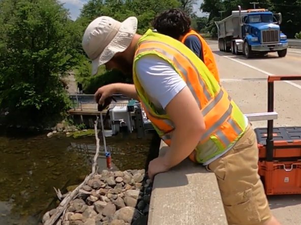 Concrete Drilled Depth Node Installation, measure distance to streambed from cone: step 6, image 1 of 1