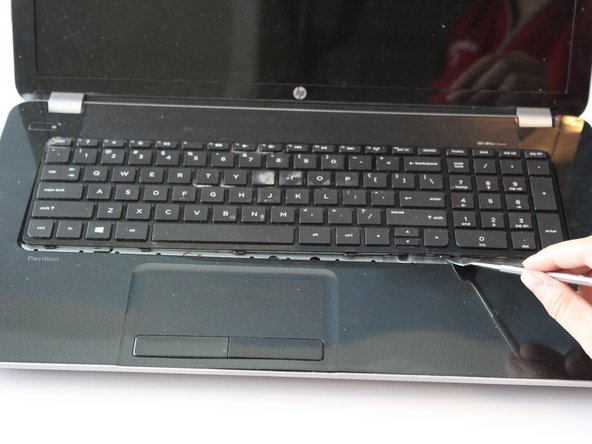 HP Pavilion 17-e146us Keyboard Replacement: step 10, image 2 of 3