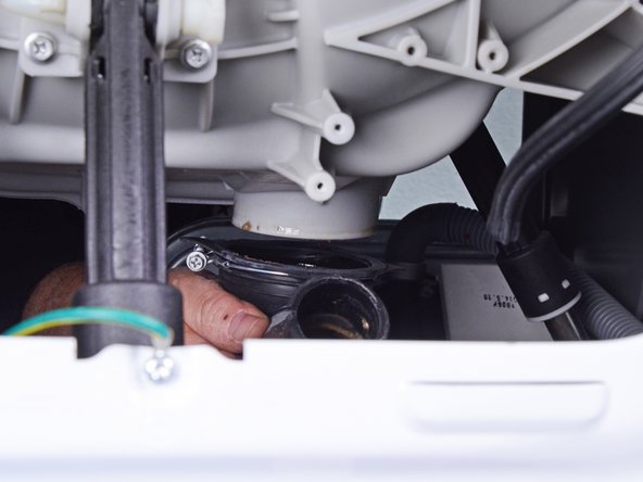 LG Front Load Washing Machine Pump Hose Replacement, Disconnect the pump hose: crwdns2935265:036crwdnd2935265:02crwdnd2935265:02crwdne2935265:0