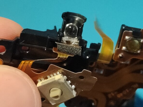 Sony A7 II Top Flex Cable replacement, Inserting AF assist lamp 2: crwdns2935265:040crwdnd2935265:02crwdnd2935265:03crwdne2935265:0