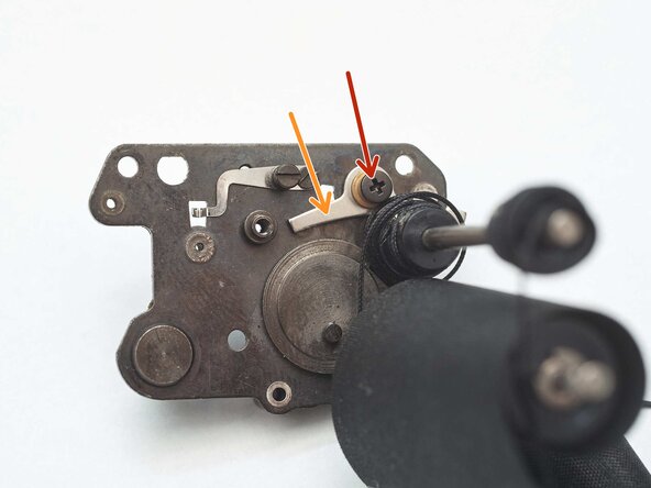 Pentax MX Shutter Curtains Disassembly, Remove opening curtain latch: step 54, image 1 of 1