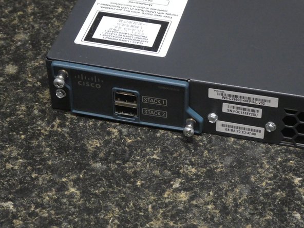 Cisco Catalyst 2960-S Series Network Switch Fan Replacement, Install Stack Module or Cover: crwdns2935265:015crwdnd2935265:03crwdnd2935265:03crwdne2935265:0