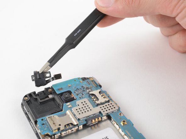 Samsung Galaxy Core Plus Motherboard Replacement, Remove the headphone jack: crwdns2935265:012crwdnd2935265:02crwdnd2935265:02crwdne2935265:0