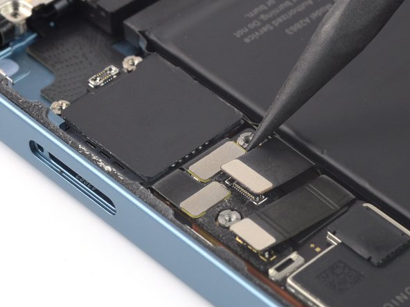 iPhone 14 Logic Board Replacement, Disconnect the lightning connector assembly cables: step 56, image 1 of 3