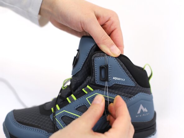 How to Replace a Dial-Lace System in a Hiking Boot, Secure the lace: crwdns2935265:07crwdnd2935265:02crwdnd2935265:03crwdne2935265:0