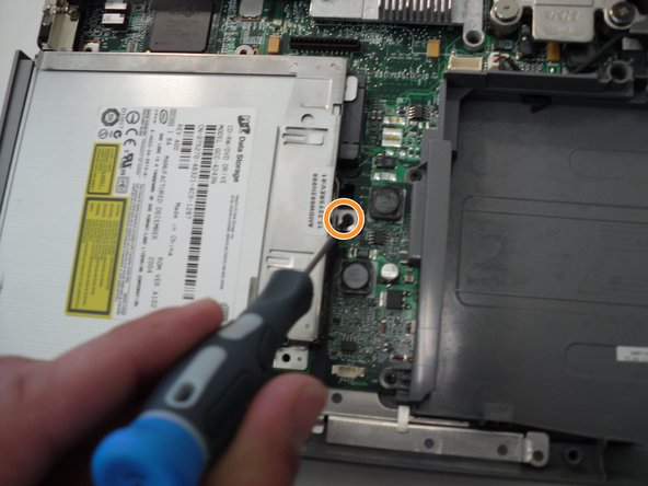 Removing Dell Inspiron 1150 Optical drive, Removing Dell Inspiron 1150 Optical drive: crwdns2935265:04crwdnd2935265:02crwdnd2935265:03crwdne2935265:0