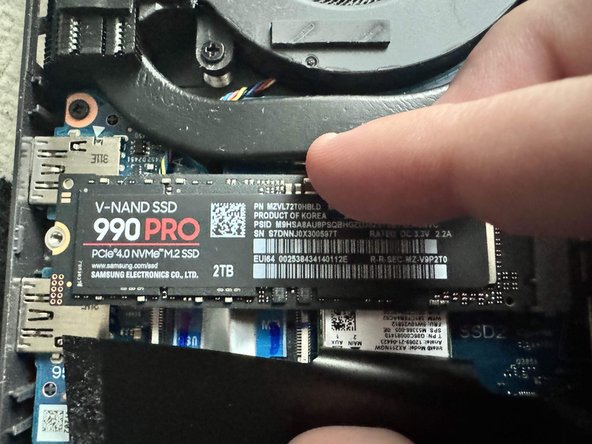 ROG Strix G16 (G614J) M.2 SSD Replacement, Screwing In 1/2: crwdns2935265:07crwdnd2935265:02crwdnd2935265:02crwdne2935265:0