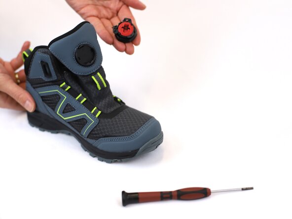 How to Replace a Dial-Lace System in a Hiking Boot, Remove the old dial: crwdns2935265:03crwdnd2935265:03crwdnd2935265:03crwdne2935265:0