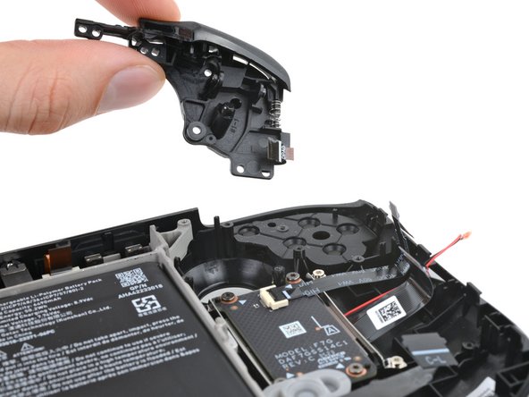 Steam Deck OLED Front Shell Replacement, Remove the left bumper assembly: crwdns2935265:041crwdnd2935265:03crwdnd2935265:03crwdne2935265:0