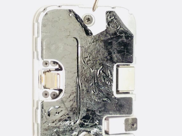 iPhone dock Teardown, Peeling back the black sticker: crwdns2935265:05crwdnd2935265:03crwdnd2935265:03crwdne2935265:0