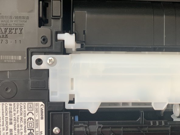 How to Fix Paper Jam in Canon Pixma TR 4520, put the screws back in place one at a time and turn them in clockwise direction to "tighten" them up: stap 13, afbeelding 2 van 3