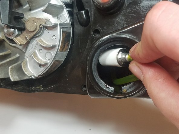 The fuel filter should rest at the bottom of the gas tank