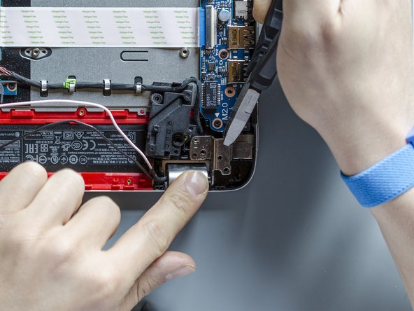 Upgrade the display panel and replace the display cable, Open the right display hinge: stap 0, afbeelding 2 van 3