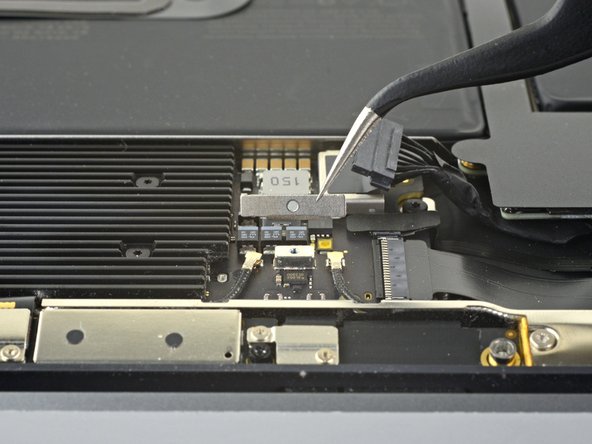 MacBook Air 13" Early 2020 Display Replacement, Disconnect the antenna bar: crwdns2935265:05crwdnd2935265:02crwdnd2935265:02crwdne2935265:0