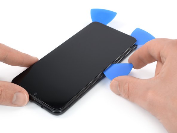 Xiaomi Redmi Note 7 Screen Replacement, Cut the lefthand-side adhesive: crwdns2935265:023crwdnd2935265:02crwdnd2935265:03crwdne2935265:0