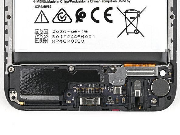 HMD Fusion Business Charging Board Replacement, Remove the loudspeaker screws: crwdns2935265:011crwdnd2935265:02crwdnd2935265:02crwdne2935265:0