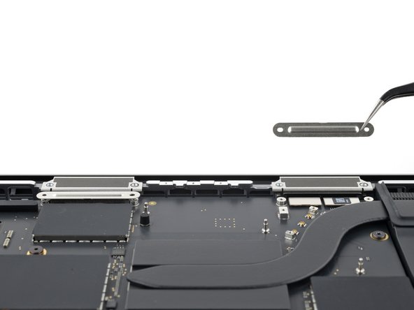 MacBook Pro 14" Late 2023 (M3) Screen Replacement, Remove the screen connector covers: crwdns2935265:027crwdnd2935265:02crwdnd2935265:03crwdne2935265:0