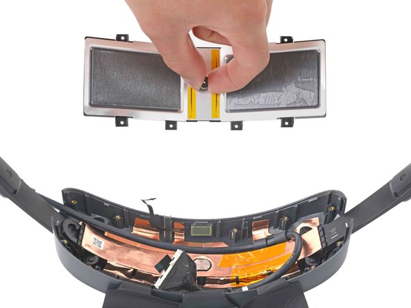 HTC Vive XR Elite Headstraps Replacement, Remove the rear metal battery enclosure: crwdns2935265:029crwdnd2935265:02crwdnd2935265:02crwdne2935265:0