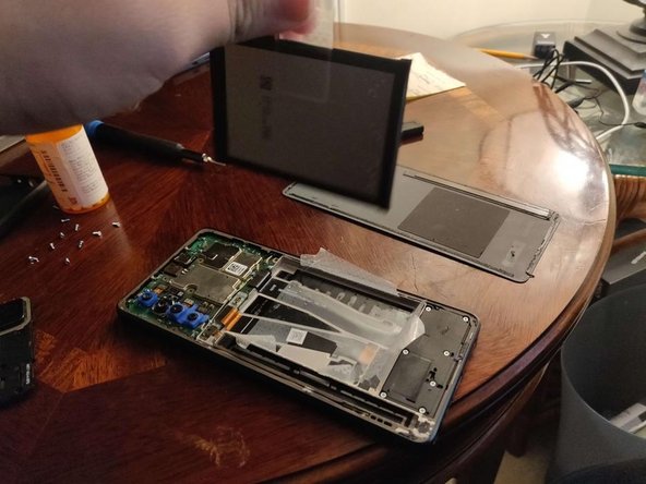 TCL Stylus Battery Replacement, Remove battery: crwdns2935265:06crwdnd2935265:02crwdnd2935265:02crwdne2935265:0