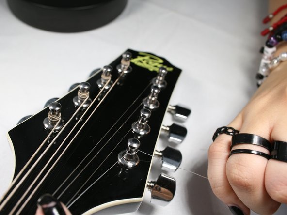How to Replace the Strings on your Rogue RM-100A A-Style Mandolin: step 7, image 1 of 3