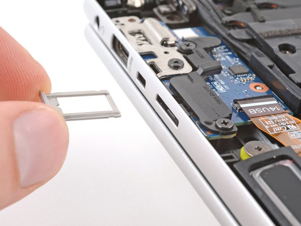 HP EliteBook 845 G9 USB Board Replacement, Remove the SIM card tray: crwdns2935265:012crwdnd2935265:03crwdnd2935265:03crwdne2935265:0