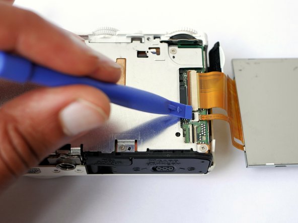 Nikon CoolPix P310 Sensor Replacement or Cleaning, Removing the Screen: crwdns2935265:04crwdnd2935265:02crwdnd2935265:03crwdne2935265:0