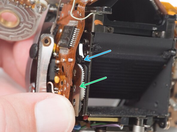 Pentax Super Program Front Lens Board Removal, Remove mirror governor: crwdns2935265:022crwdnd2935265:03crwdnd2935265:03crwdne2935265:0