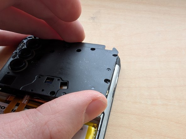 Motorola Moto G Play (2023) Teardown, Remove the motherboard cover: crwdns2935265:05crwdnd2935265:02crwdnd2935265:03crwdne2935265:0